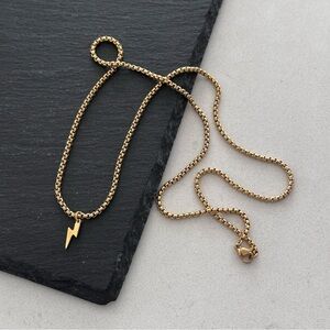 LIGHTENING BOLT PENDANT ON ROUNDED BOX CHAIN IN GOLD